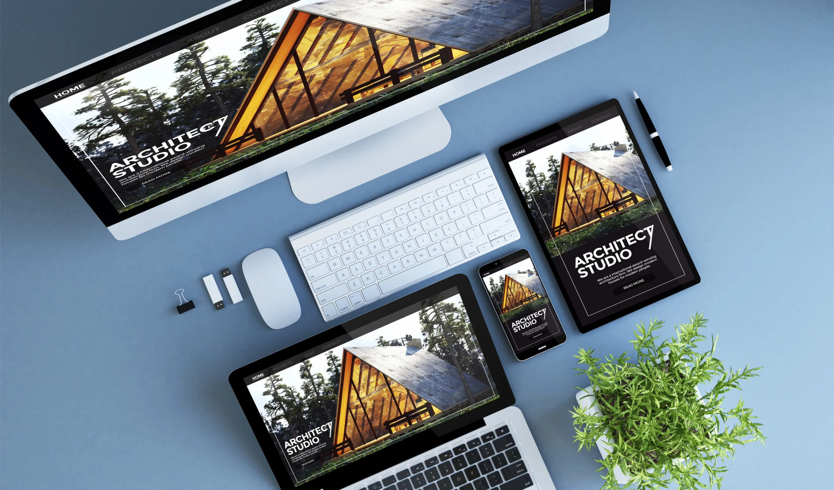 The same website shown on a desktop screen, a tablet, a laptop and a phone