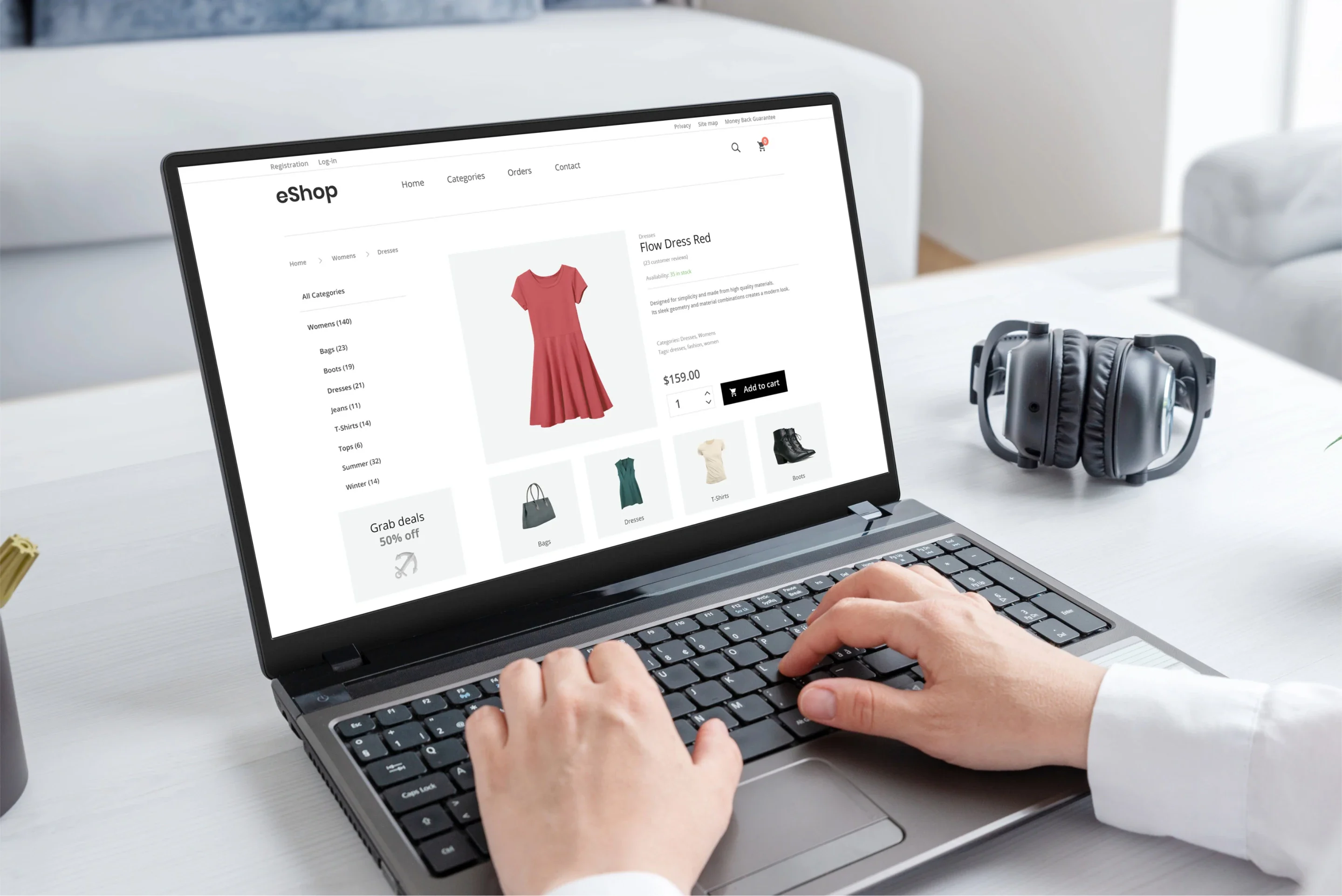 Hands on the keyboard of a laptop showing the product page of an online store